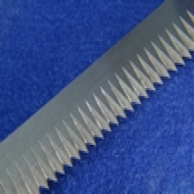 Vacuum packing blade